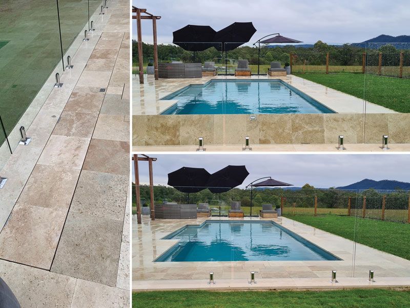 A Swimming Pool With A Glass Fence Around It — Aussie UnderCover In South Nowra, NSW