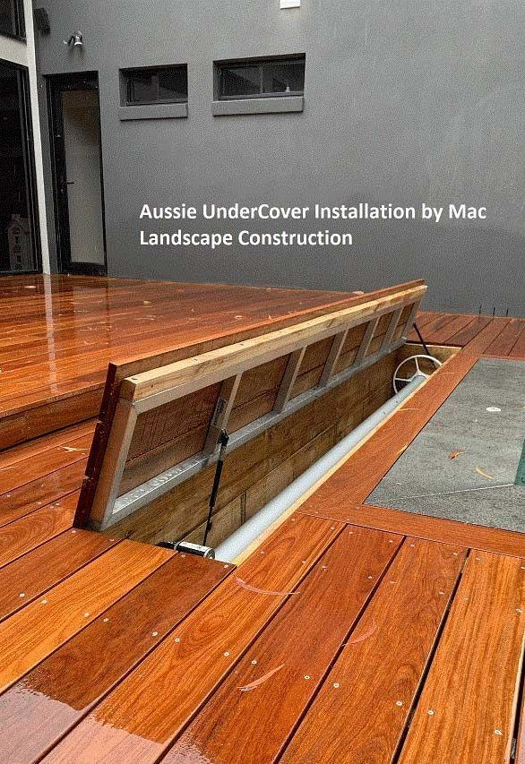 A Wooden Deck With A Door Open Next To A Pool — Aussie UnderCover In South Nowra, NSW
