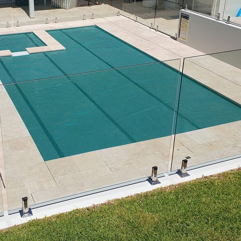A Large Swimming Pool With A Glass Fence Around It — Aussie UnderCover In Sunshine Coast, QLD