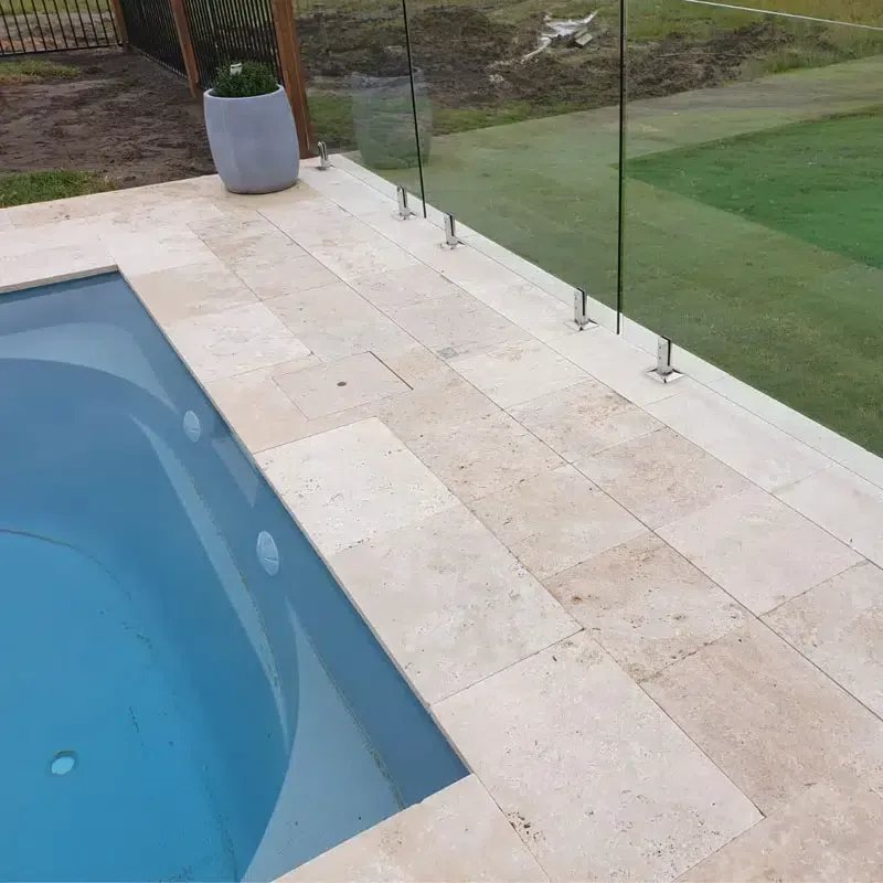 A Swimming Pool With A Glass Fence Around It — Aussie UnderCover In South Nowra, NSW