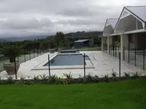 There Is A Large Swimming Pool In The Backyard Of A House — Aussie UnderCover In South Nowra, NSW
