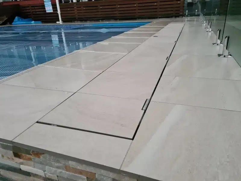 A Tiled Walkway Leading To A Swimming Pool — Aussie UnderCover In South Nowra, NSW