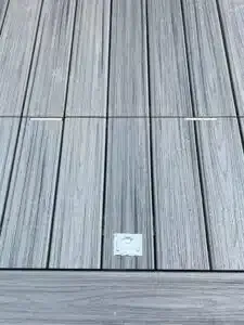 A Close Up Of A Wooden Deck With A Sticker On It — Aussie UnderCover In South Nowra, NSW