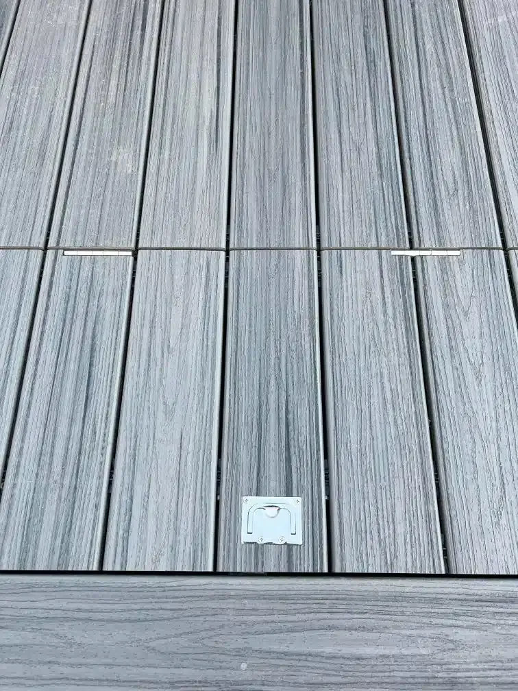 A Close Up Of A Wooden Deck With A Light On It — Aussie UnderCover In South Nowra, NSW