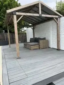 A Wooden Deck With A Pergola And A Couch On It — Aussie UnderCover In South Nowra, NSW
