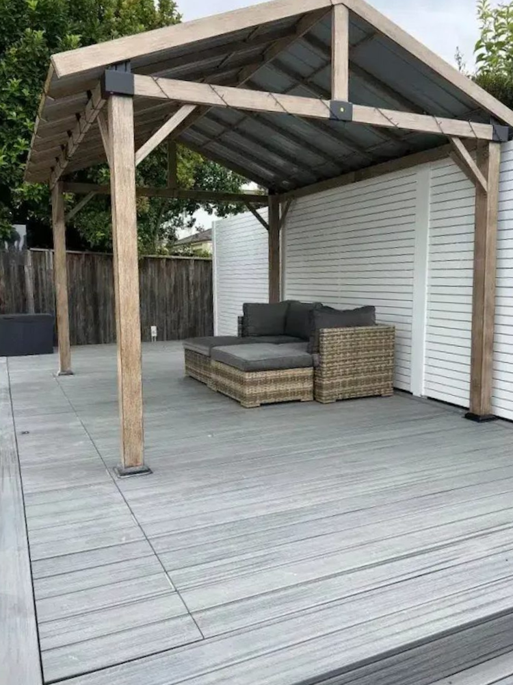 A Patio With a Pergola and a Couch Underneath It — Aussie UnderCover In South Nowra, NSW
