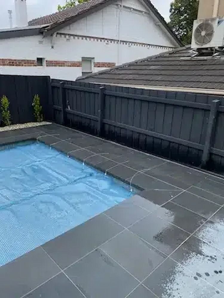 There is a Swimming Pool in the Backyard of a House — Aussie UnderCover In South Nowra, NSW
