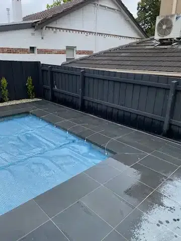 There Is A Swimming Pool In The Backyard Of A House — Aussie UnderCover In South Nowra, NSW