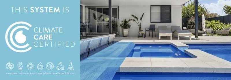 A swimming pool in front of a house that is climate care certified — Aussie UnderCover In South Nowra, NSW