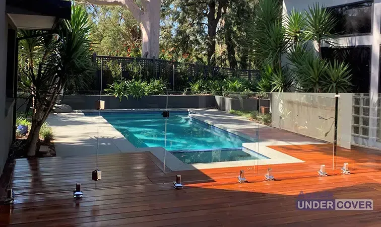 There Is A Large Swimming Pool In The Backyard Of A House — Aussie UnderCover In South Nowra, NSW