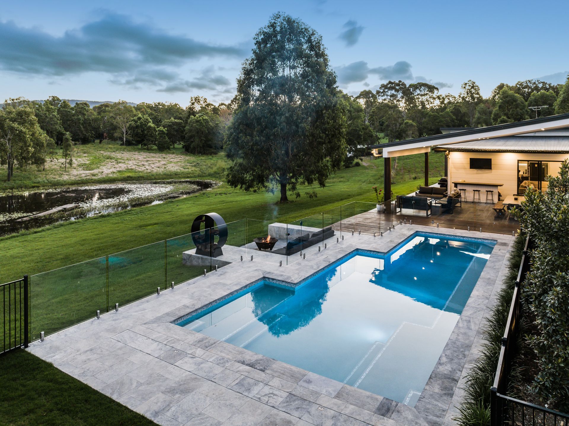 There is a Swimming Pool With a Gazebo in the Backyard — Aussie UnderCover In South Nowra, NSW