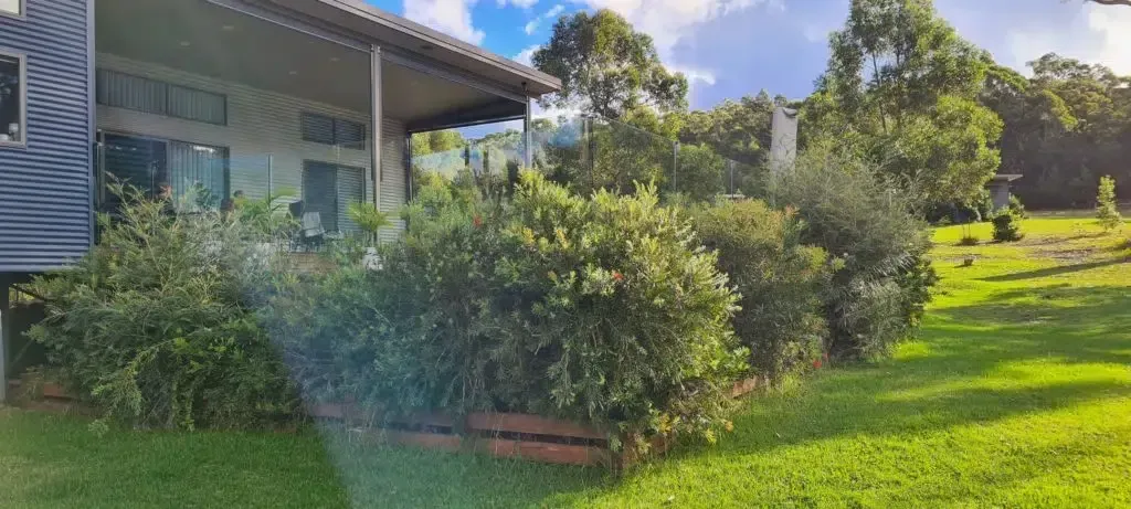 A House With A Porch And A Lot Of Bushes In Front Of It — Aussie UnderCover In South Nowra, NSW