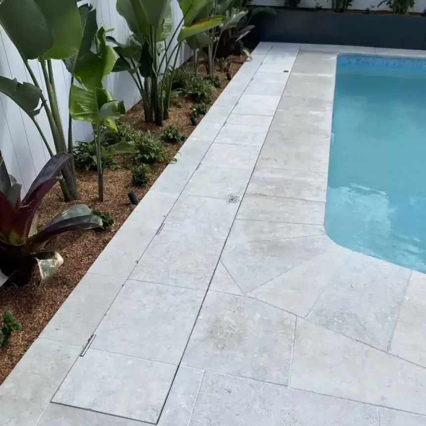 A Couch and Chair Are Sitting Next to a Pool  — Aussie UnderCover In South Nowra, NSW
