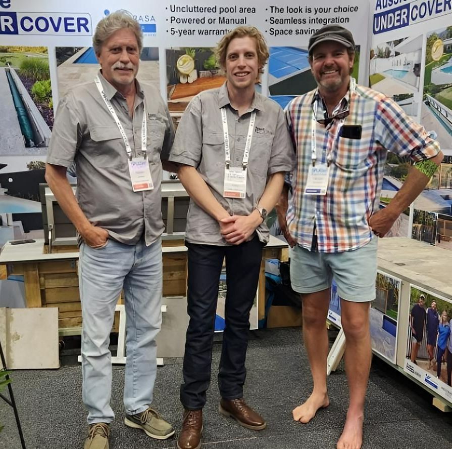 Three Men Standing In Front Of A Sign That Says Recover — Aussie UnderCover In South Nowra, NSW