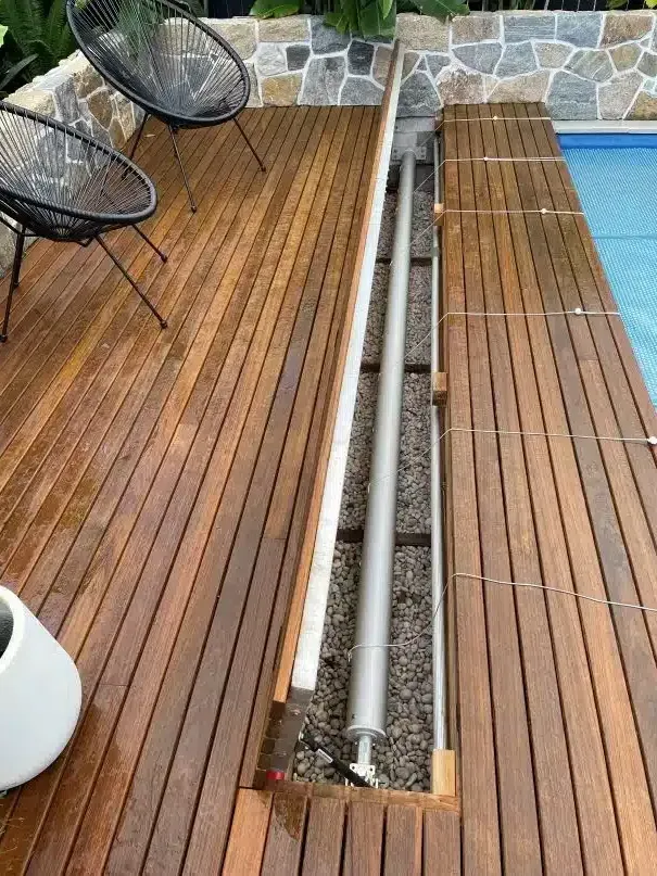 A Wooden Deck With Chairs And A Pipe Coming Out Of It — Aussie UnderCover In South Nowra, NSW