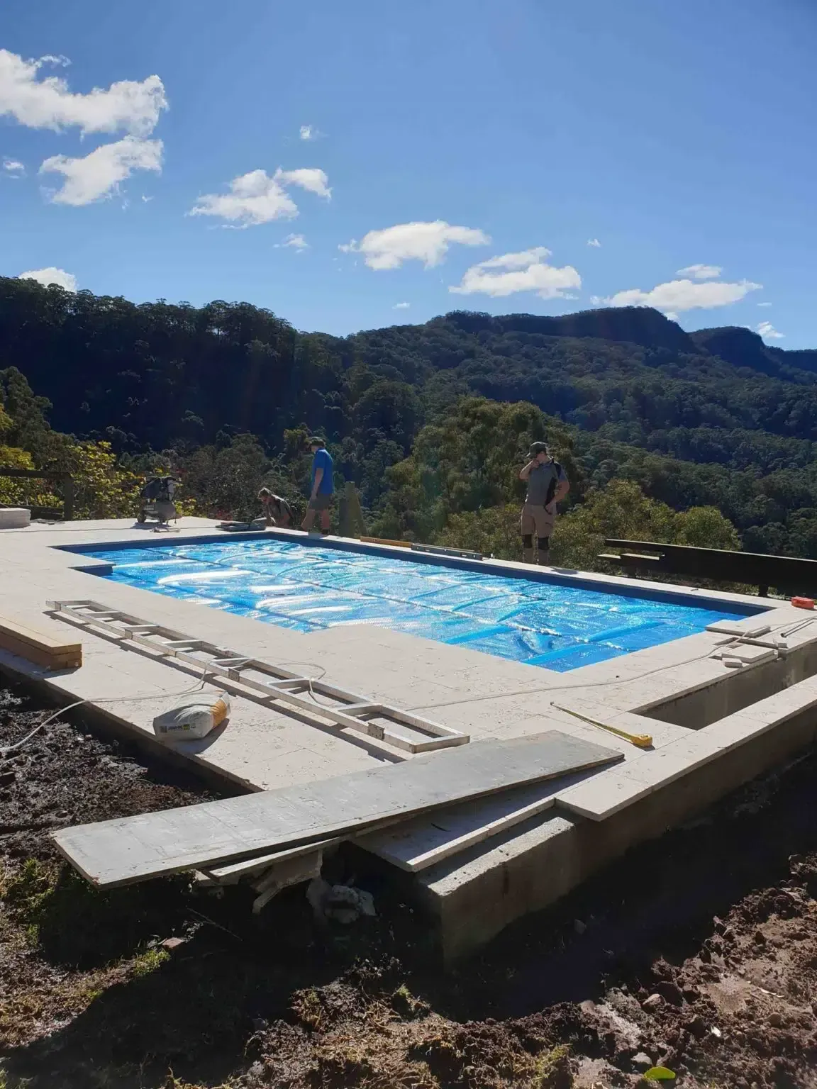 A Large Swimming Pool With A View Of Mountains In The Background — Aussie UnderCover In South Nowra, NSW
