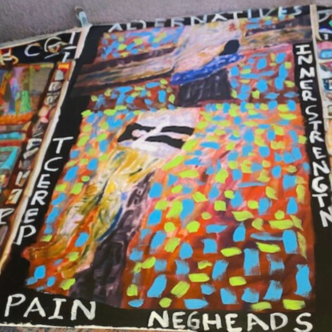 A painting that says pain on it