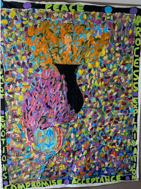 A colorful painting with the word peace on it