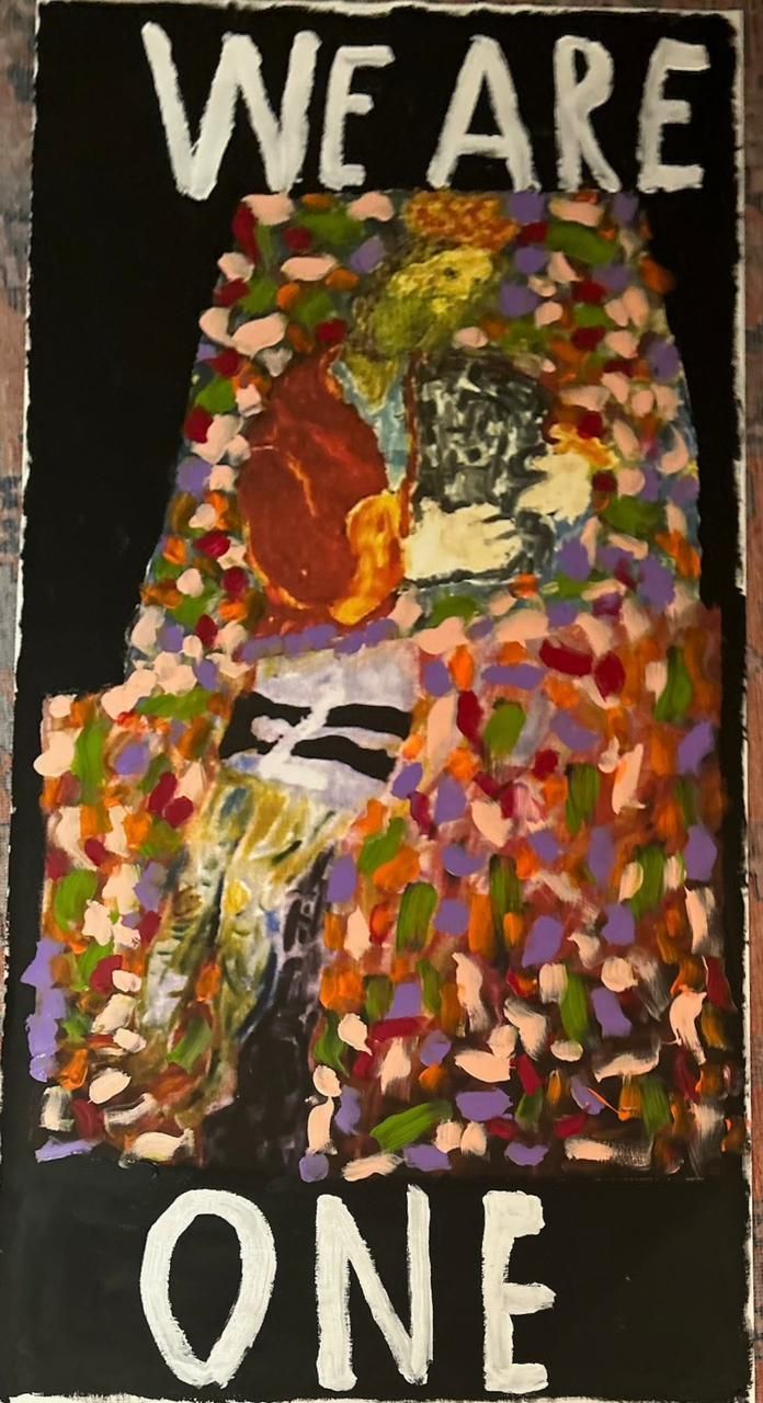 A painting that says we are one on it