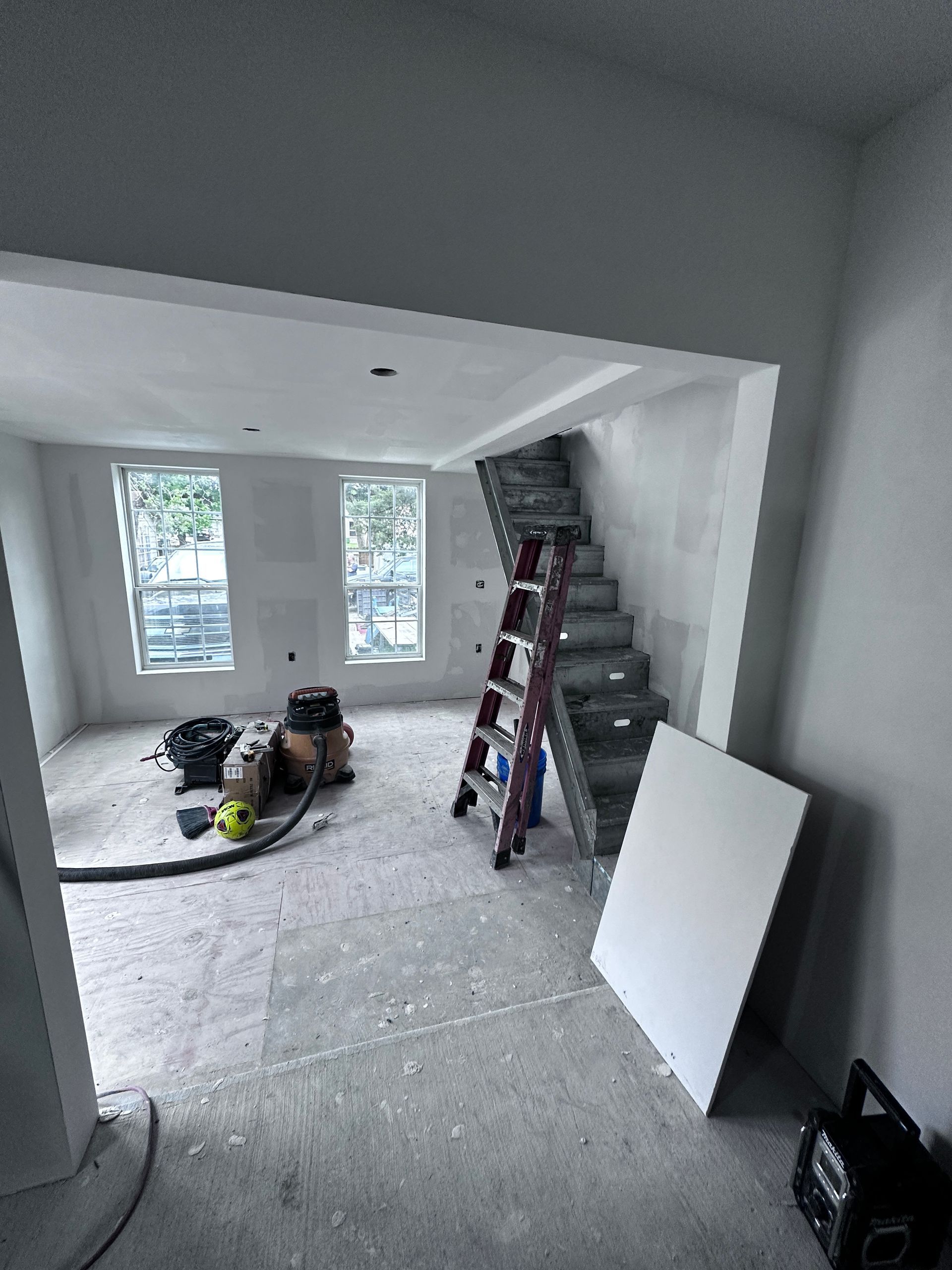 There is a ladder in the middle of the room.