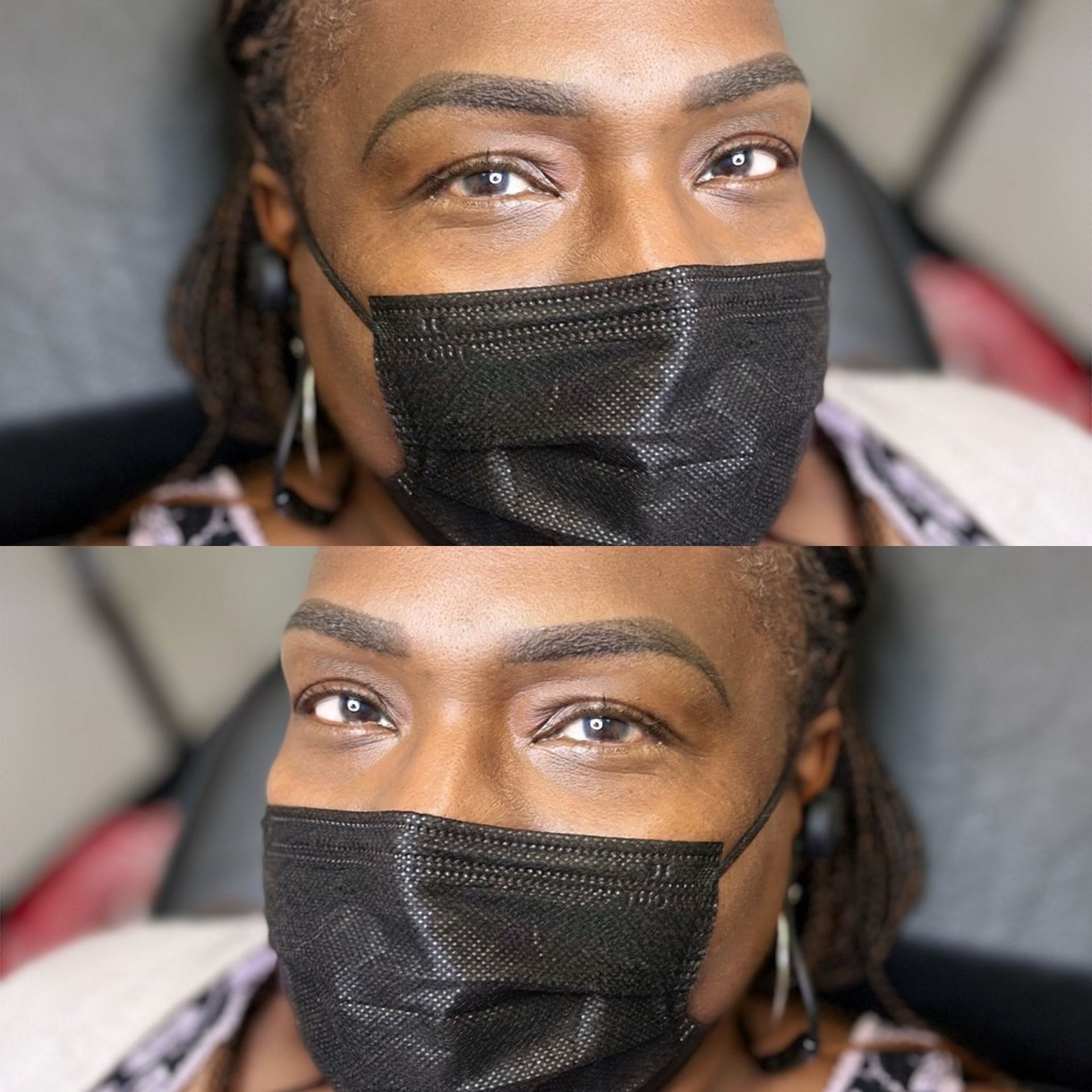 A close up of a woman wearing a black face mask