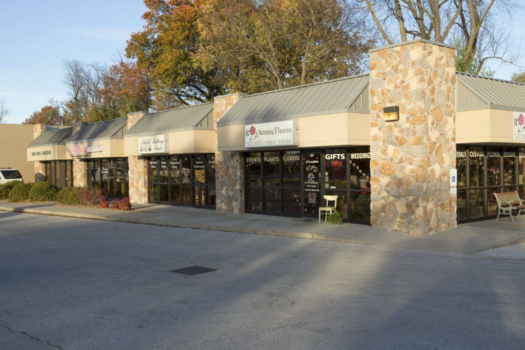 A multi-unit commercial building managed by C. Arch Bay Company.