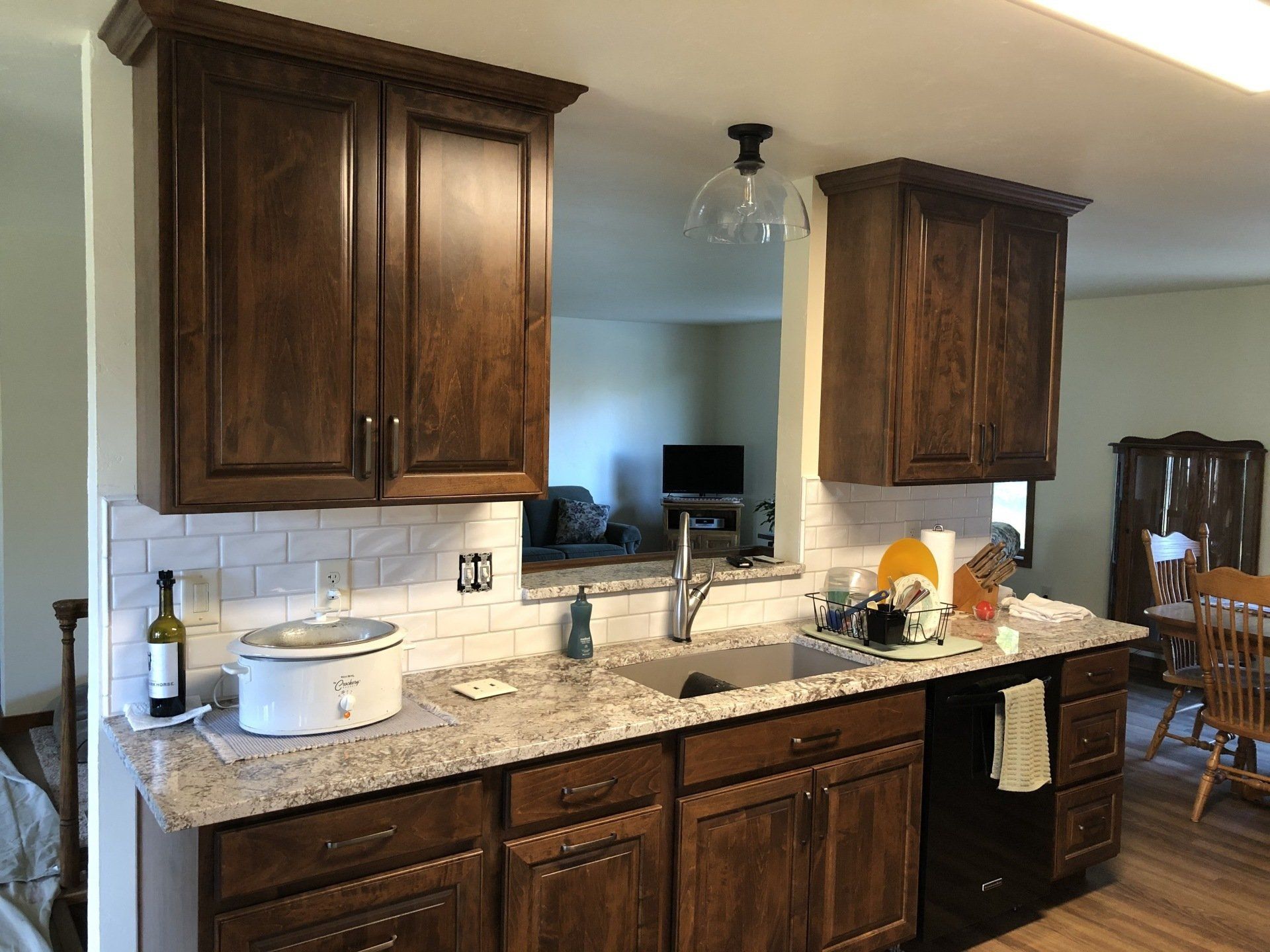 Kitchen with Brown Cabinet — Neenah, WI — CNK Cabinetry, LLC