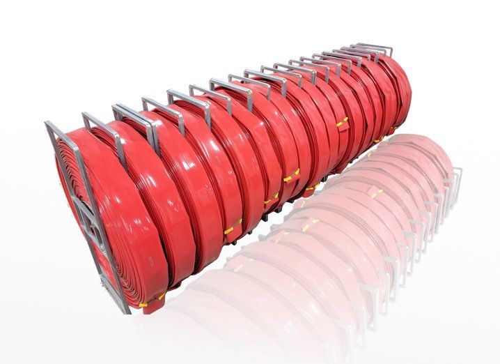 Rolls of Red Dragster hoses.