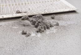 Dirty Air Filter And Dust Pile Dirty Air Filter And Dust Pile