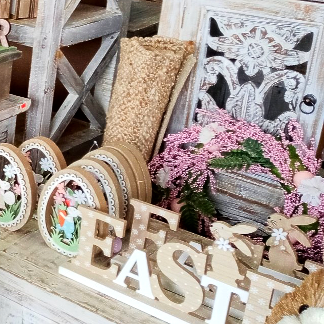 A wooden sign with the word easter on it