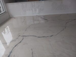 A close up of a marble floor in a room — San Leandro, CA — Mission Flooring and Countertop Design