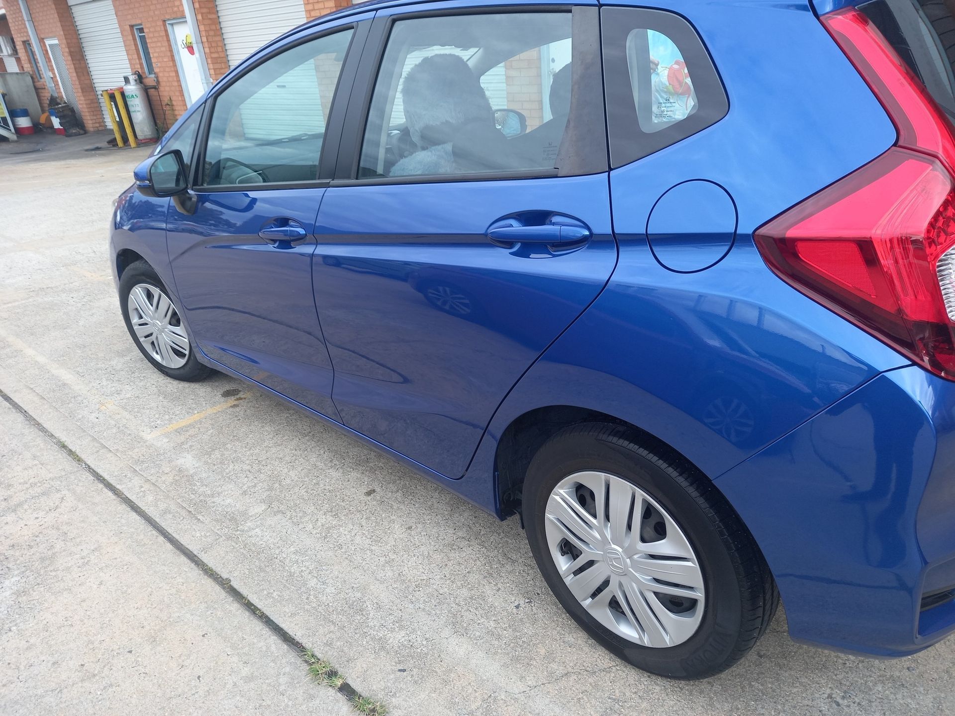 Blue Car Parked on a Concrete Surface — Moto Bodyworks in Fyshwick, ACT