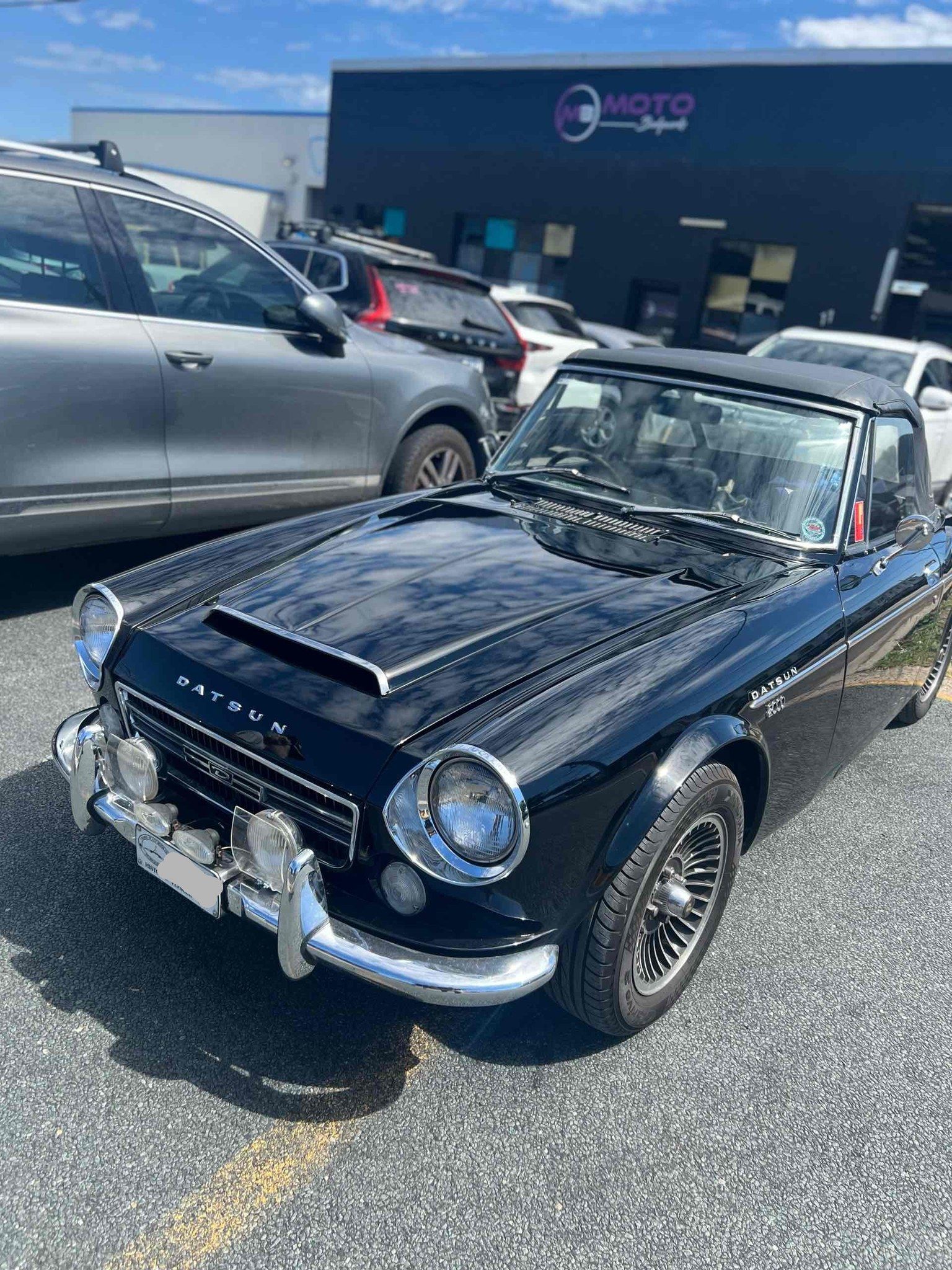 A Car with Round Headlights is Parked — Moto Bodyworks in Fyshwick, ACT