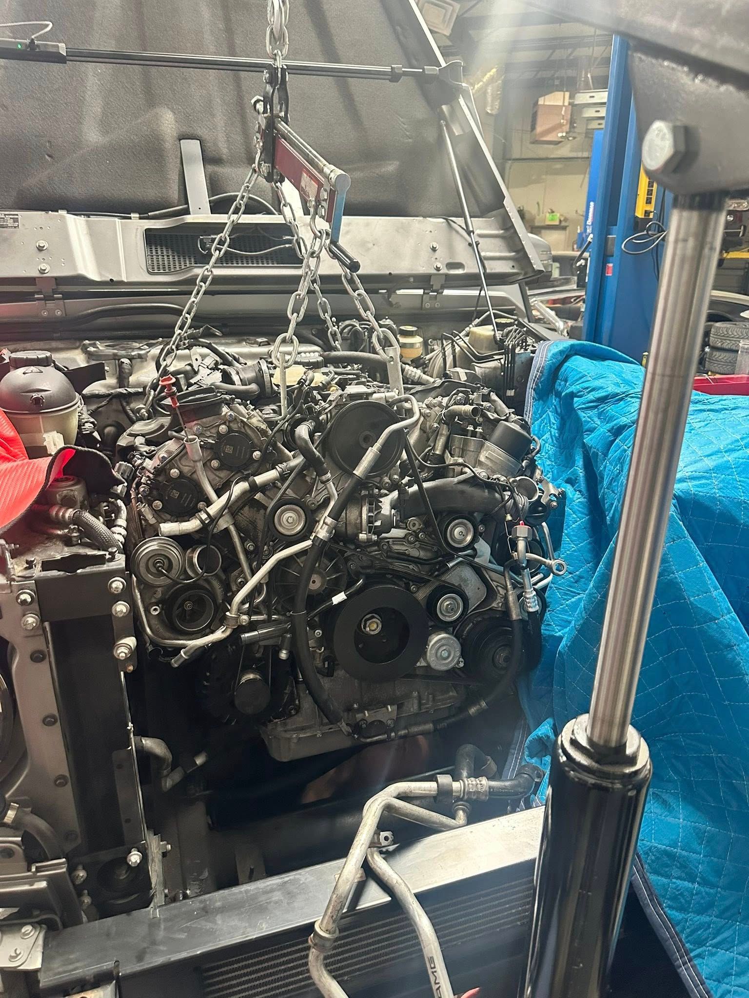 Engine Disassembly And Inspection On Automotive Workbench | UAC