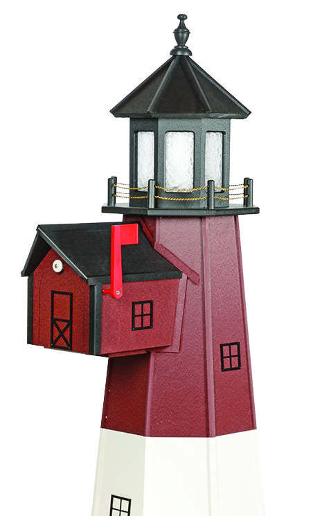 a red lighthouse with a red mailbox attached to it