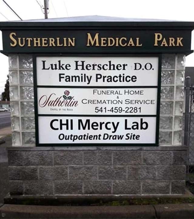 A sign for luke herscher d.o. family practice and chi mercy lab