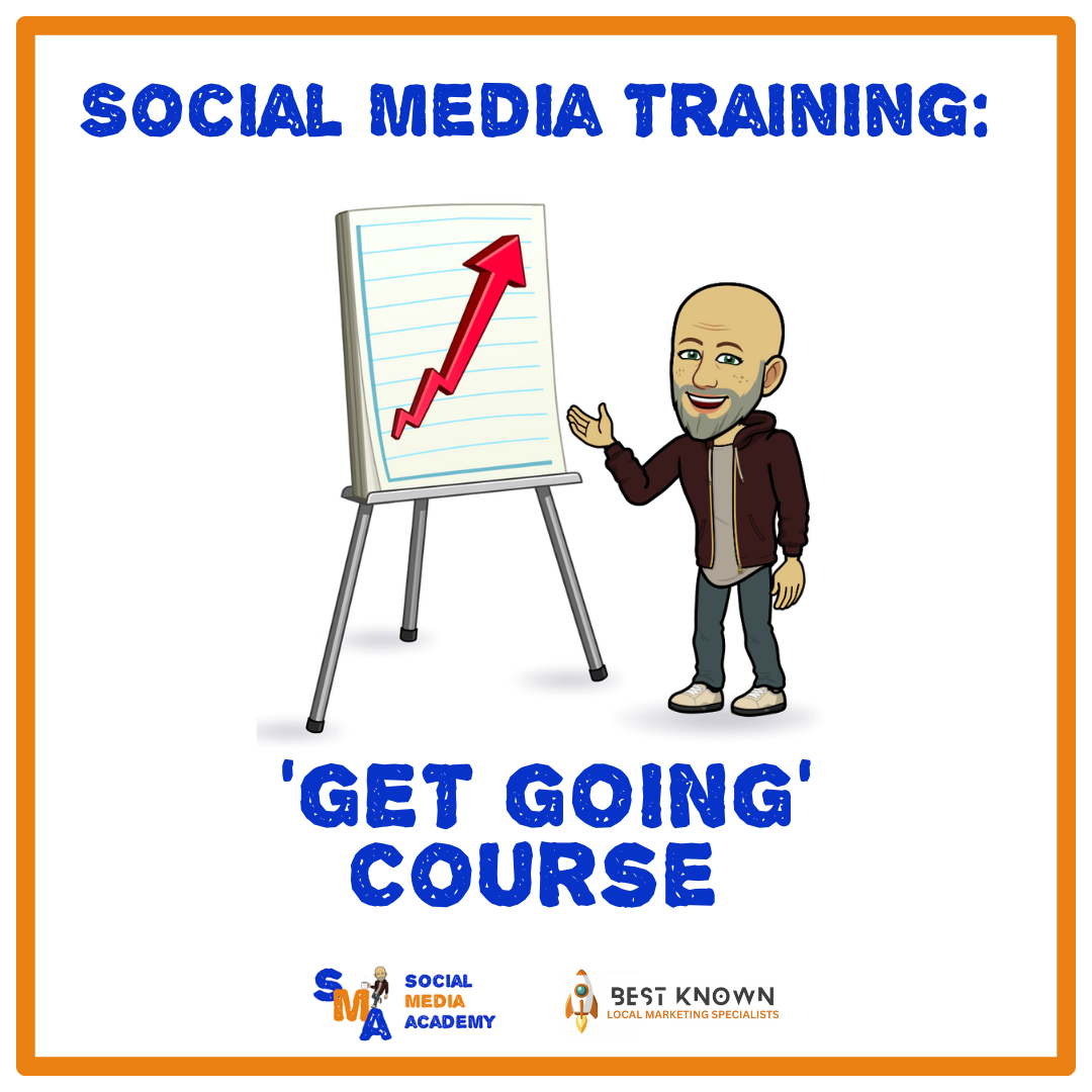 A man is standing in front of a whiteboard with an arrow pointing up.