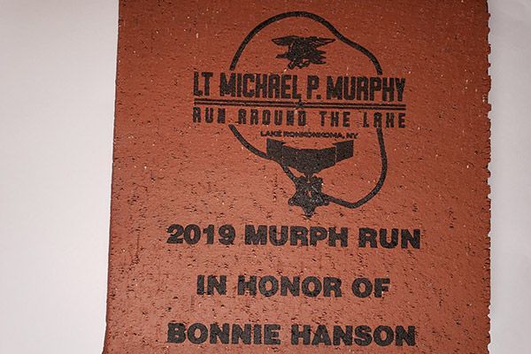 A plaque for the 2019 murph run in honor of bonnie hanson