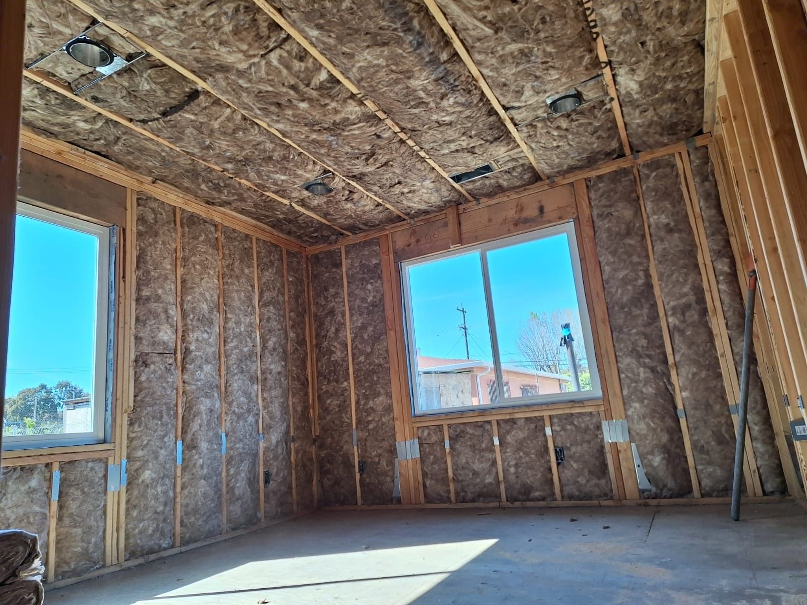 A room with a lot of insulation on the walls and ceiling.