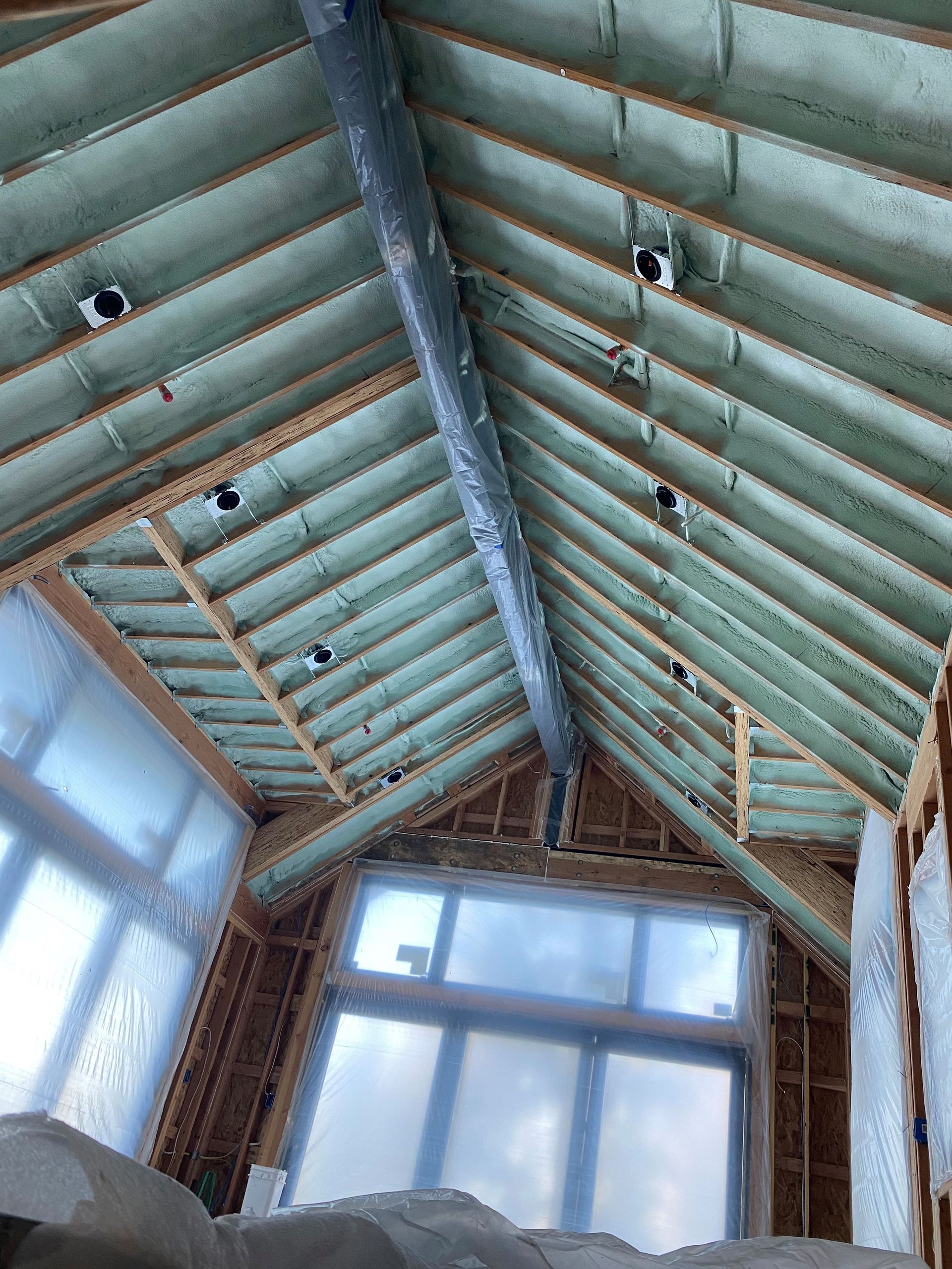 Looking up at the ceiling of a house under construction.