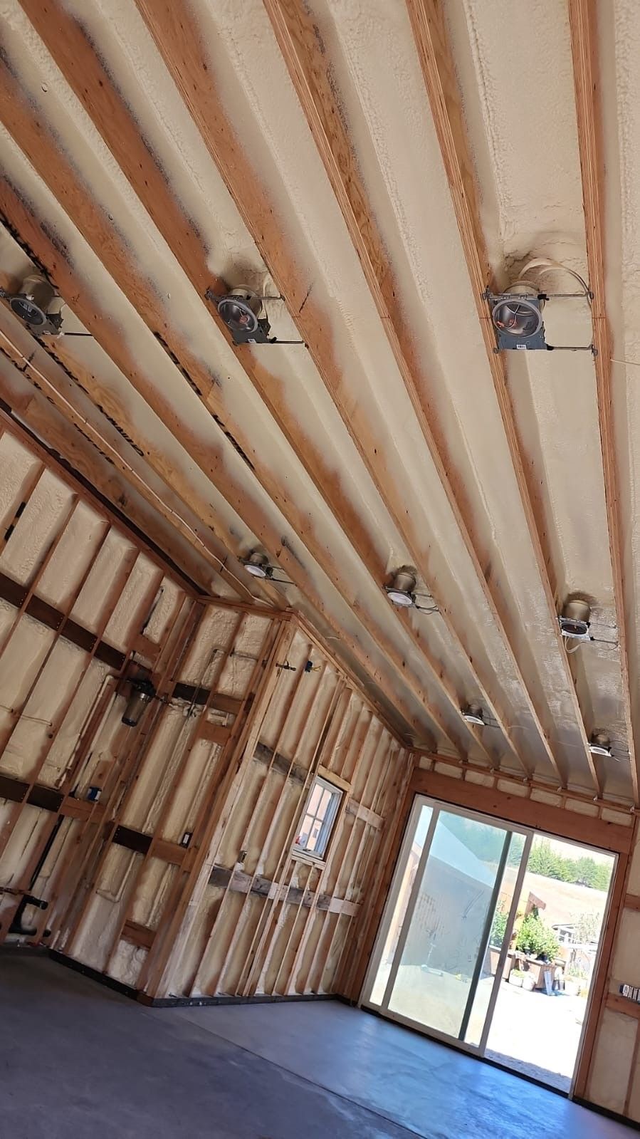 A room with a lot of insulation on the ceiling and walls.