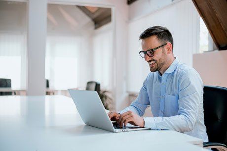 businessman smiling and working