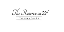 Logo for "The Reserve on 29th Townhomes" in elegant script.