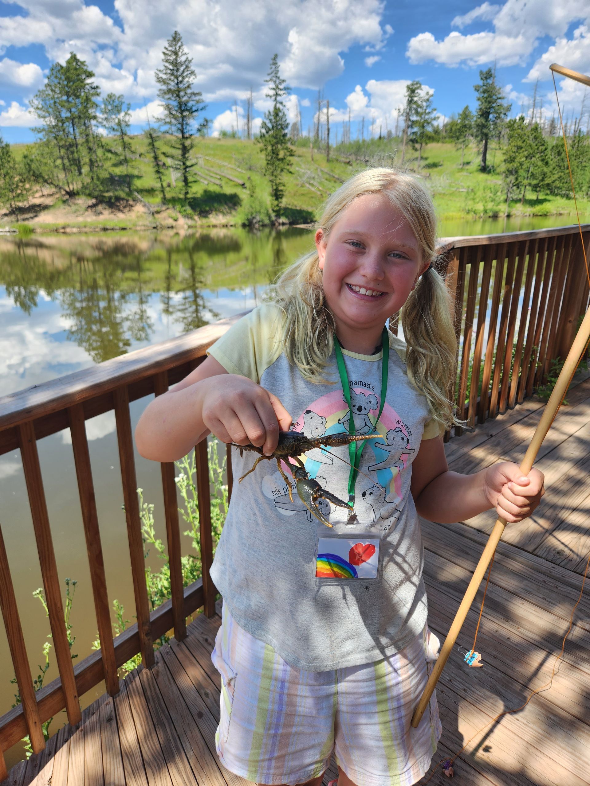 Camper by pond with crawdad