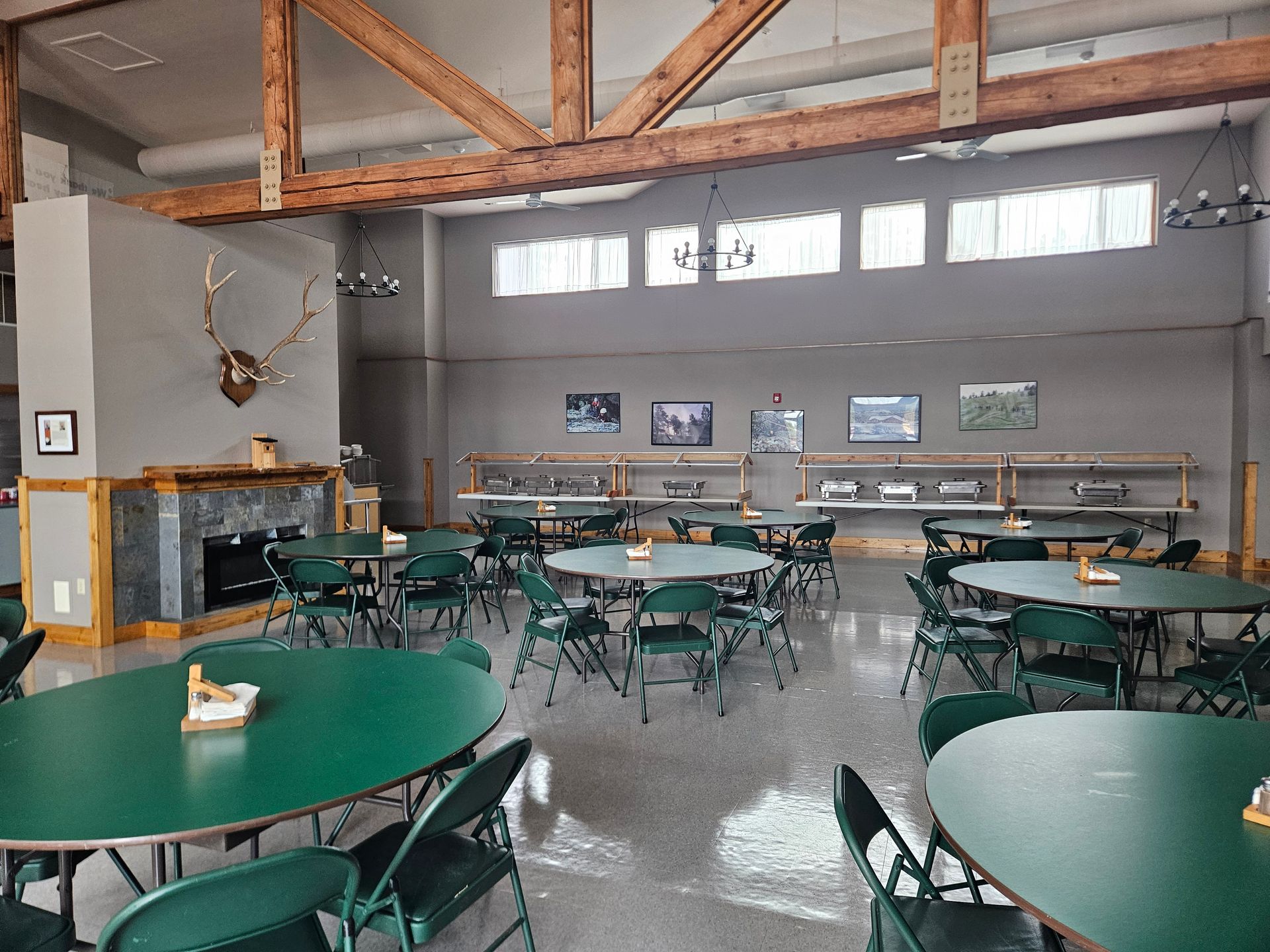 View of dining hall with tables & chairs.