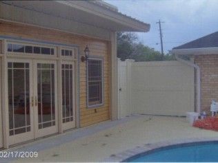 Exterior view: house with glass doors