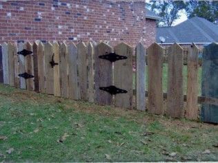 Wooden fence with pointed tops