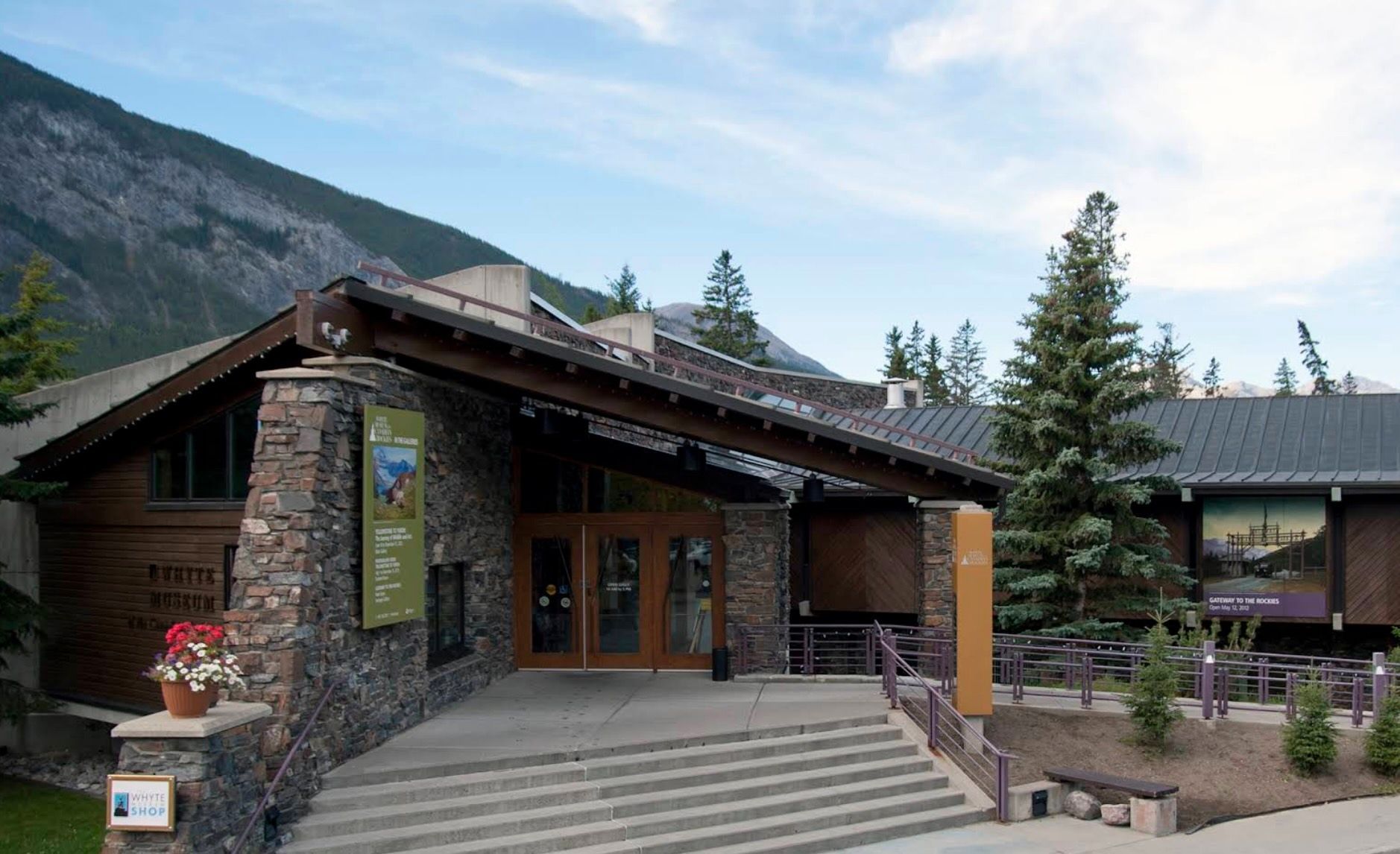 A building with a red awning that says gift gallery