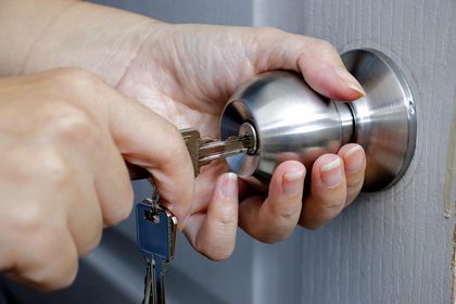 Unlocking door with a key — Chicago, IL — Ace Lock & Key Smith