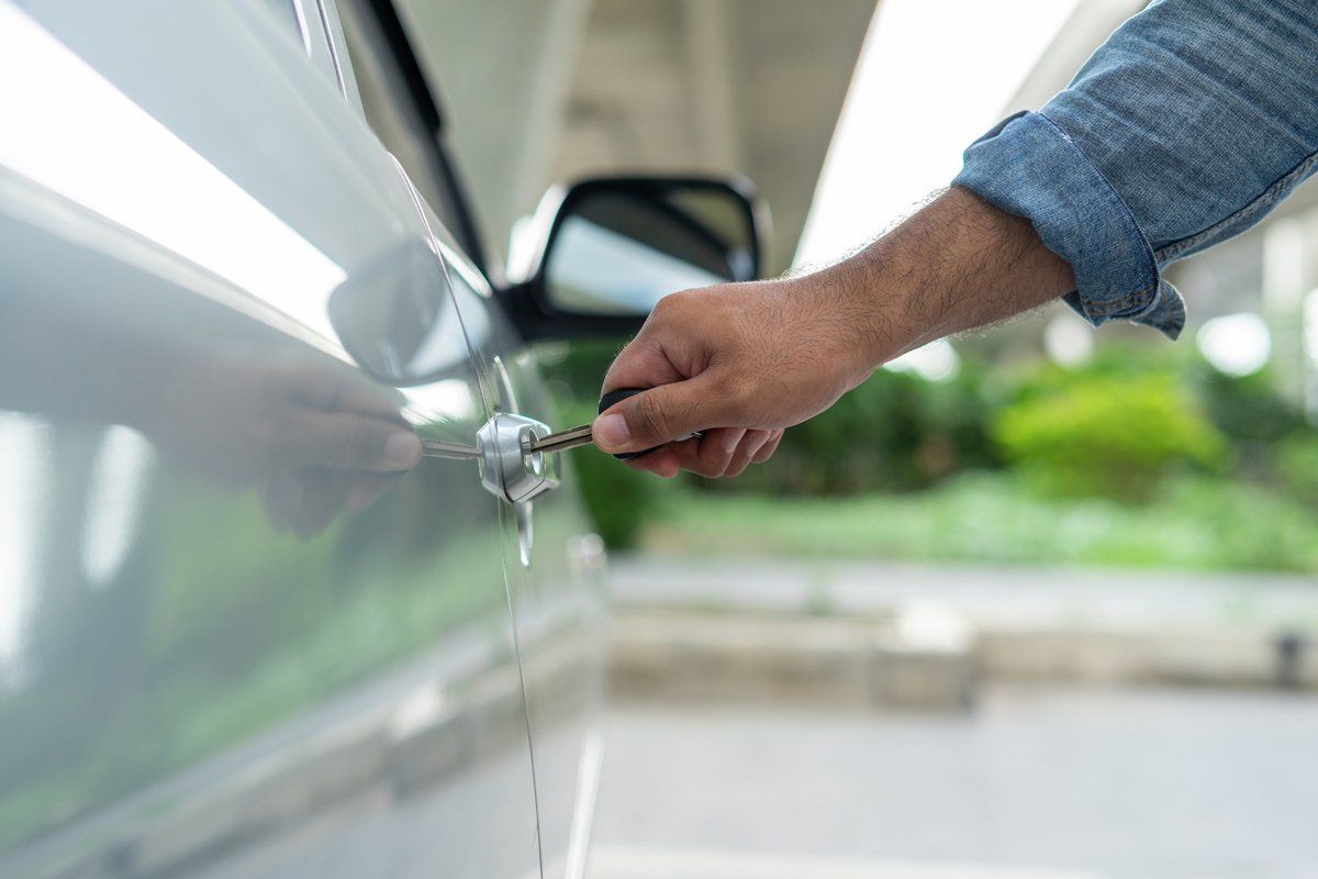Unlocking car door with a key — Chicago, IL — Ace Lock & Key Smith